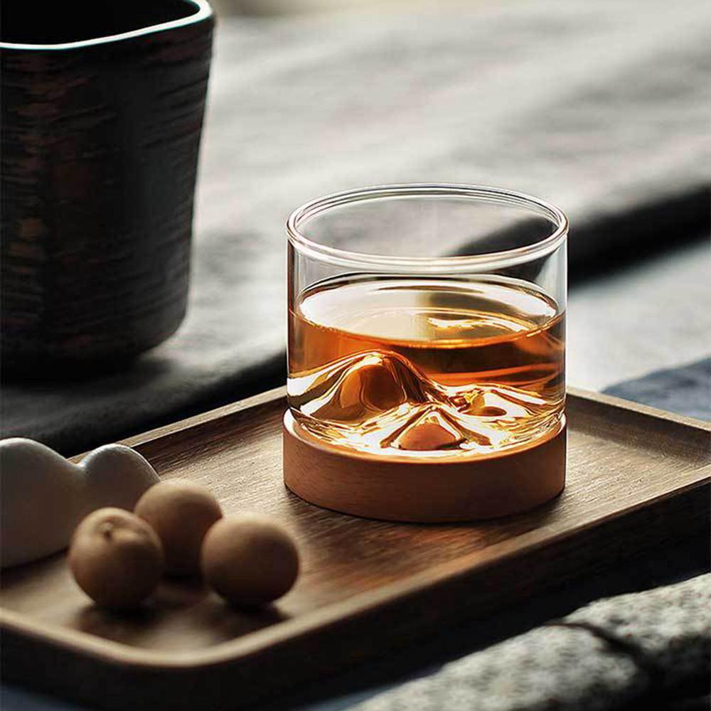 https://ecletticos.com/cdn/shop/products/Mountain-Whiskey-Glass-with-Wooden-Base-Rocks-Beer-Glass-Wine-Cup-Irish-Bourbon-Scotch-Whiskey-Glasses_1200x.jpg?v=1626719223